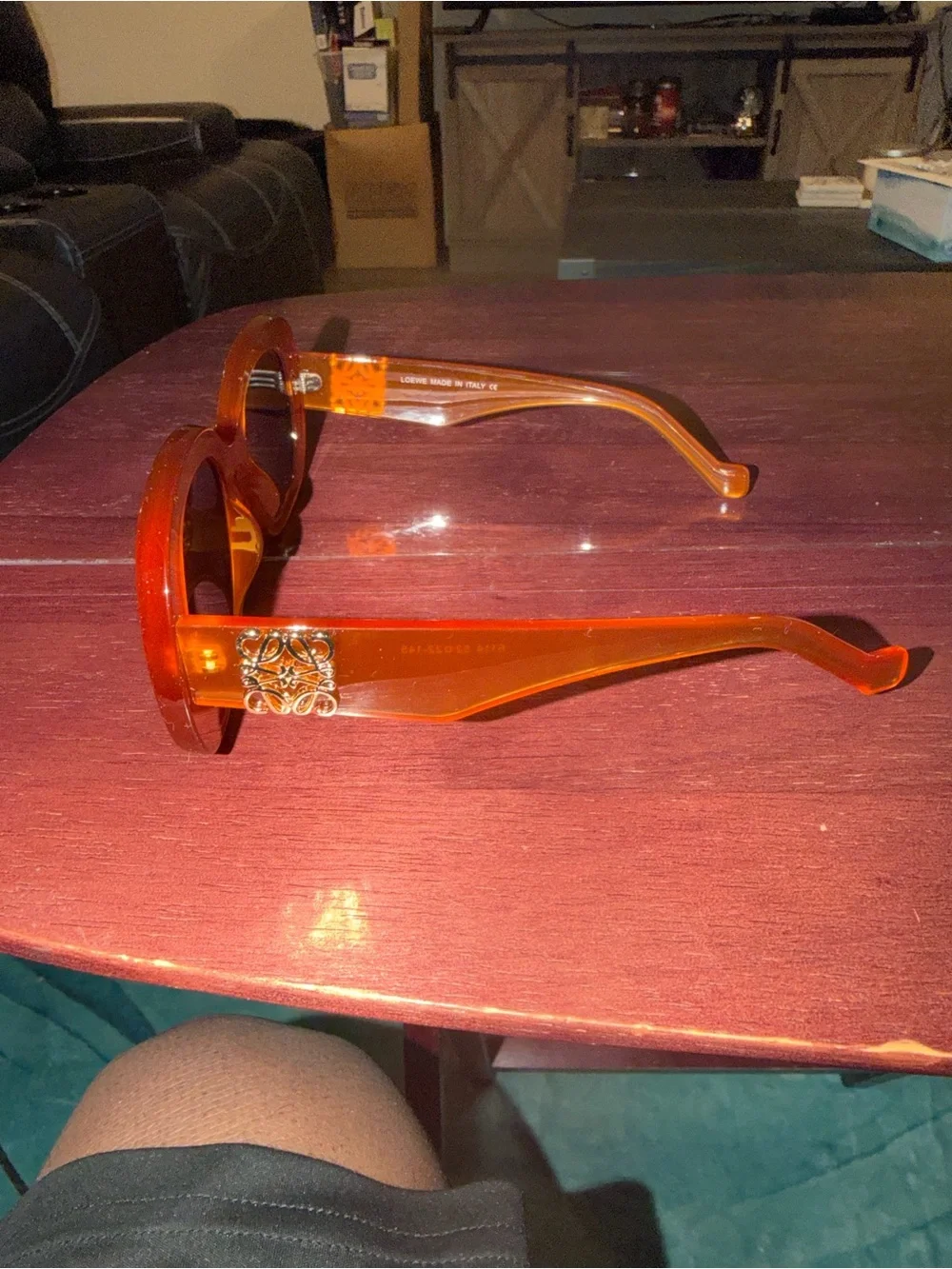 Loewe Orange Oval Sunglasses with Black Lenses